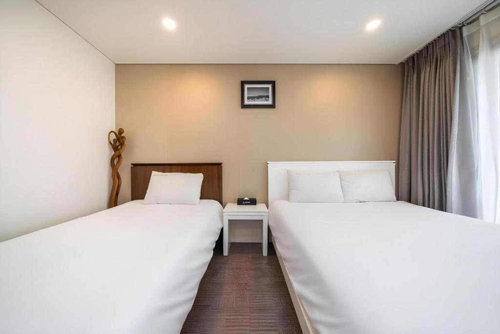 Sea View Hotel Jeju Bagian luar foto