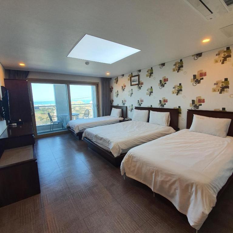 Sea View Hotel Jeju Bagian luar foto